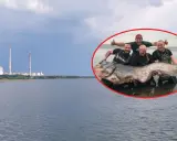 Czterech wędkarzy z gigantycznym sumem na tle elektrowni w Rybniku. Zalew Rybnik skrywa wielkie tajemnice.